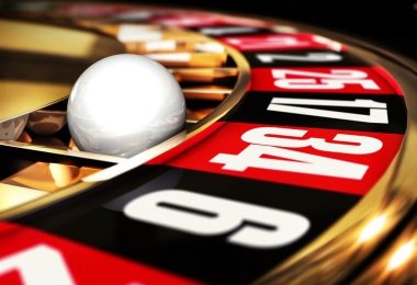 Roulette table display on mobile phone screen showing wheel and betting layout